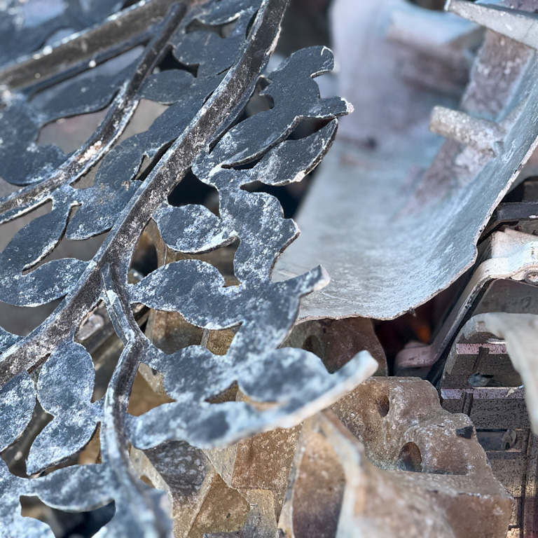 Broken cast aluminum pieces