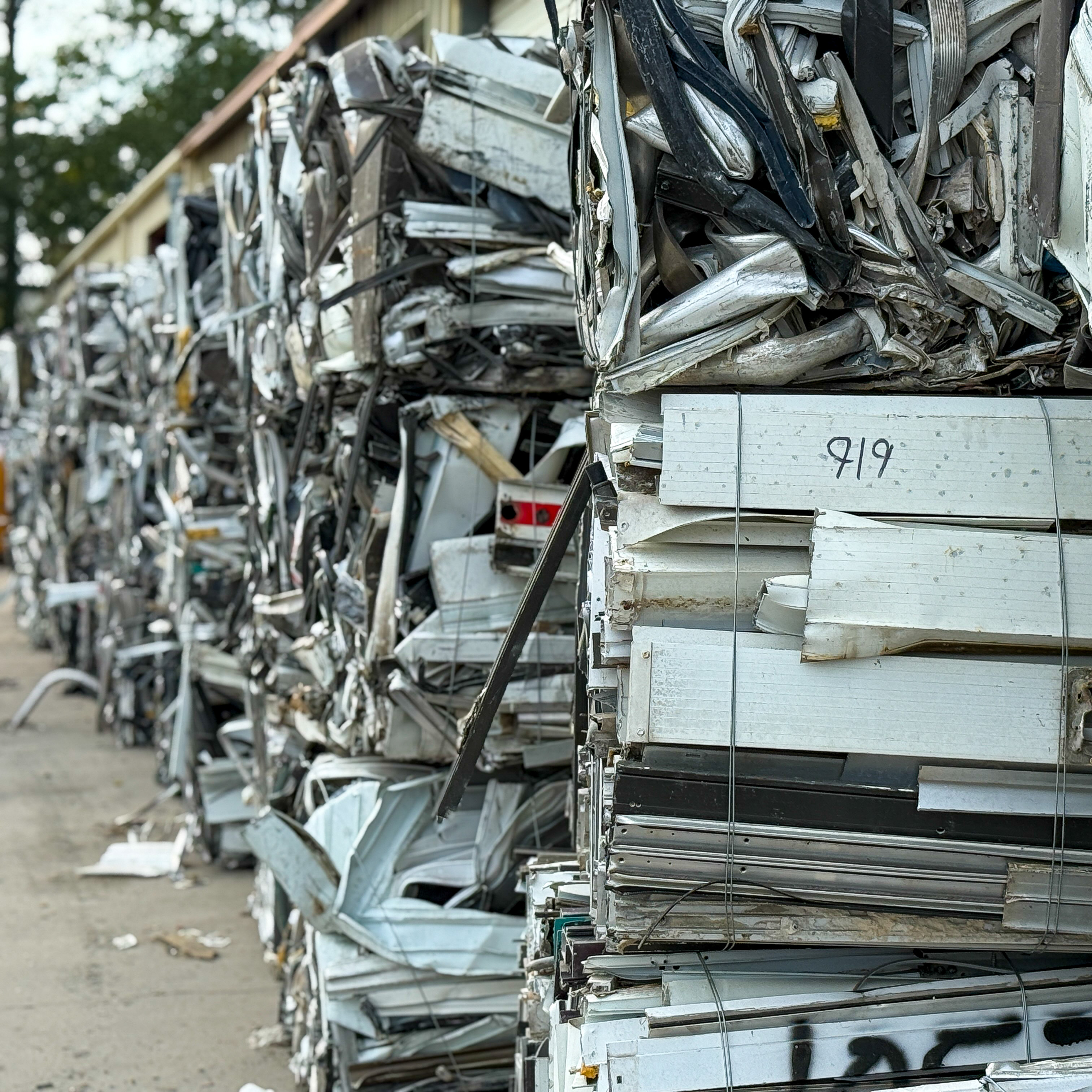 Baled metal stacked neatly in the yard