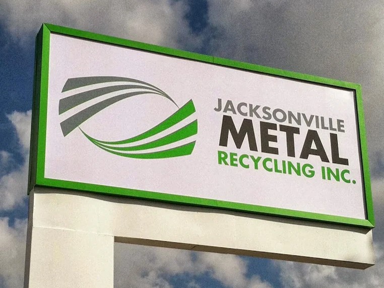 Entrance sign and drive at Jacksonville Metal Recycling on Philips Highway